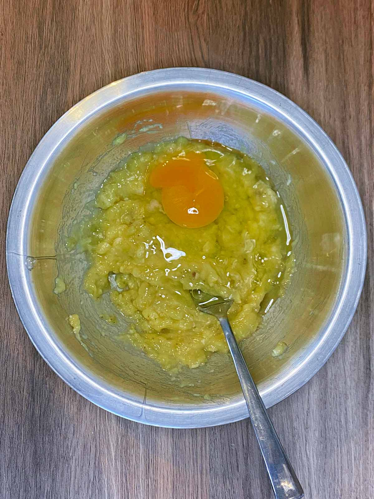 Egg and vanilla added to the bowl.